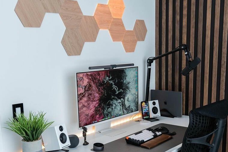 Nanoleaf Elements installed above a desktop PC. 