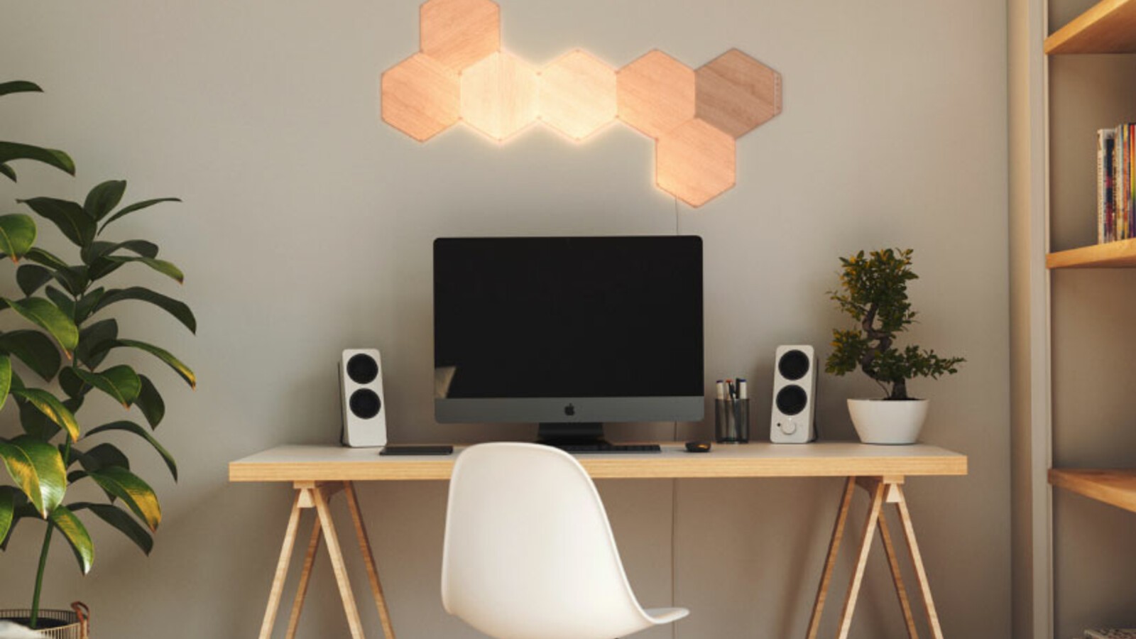 Nanoleaf Elements lights positioned above a desk.